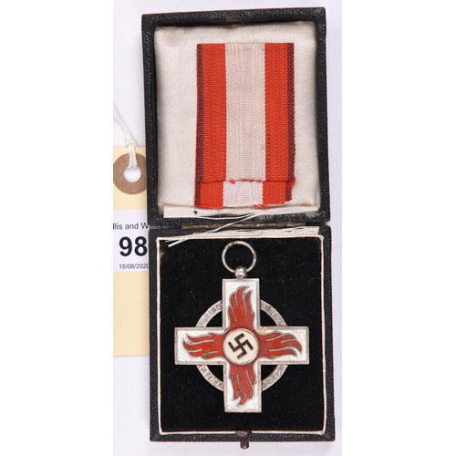 98 - A Third Reich Fire Service Cross, 2nd class, GC (slight wear to plating), in its case with short len... 