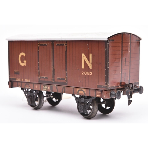 100 - A Gauge One Marklin for Gamages GNR 8-ton Freight Van, 2882. With brown wood-effect litho printed si... 