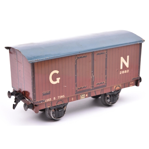 102 - A Gauge One Marklin for Gamages GNR 8-ton Freight Van, 2882. With brown wood-effect litho printed si... 