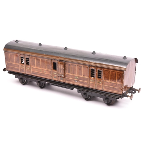 110 - A Carette Gauge One non-corridor bogie guards van. A G.N.R. example in lined teak effect livery, RN ... 