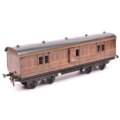 110 - A Carette Gauge One non-corridor bogie guards van. A G.N.R. example in lined teak effect livery, RN ... 