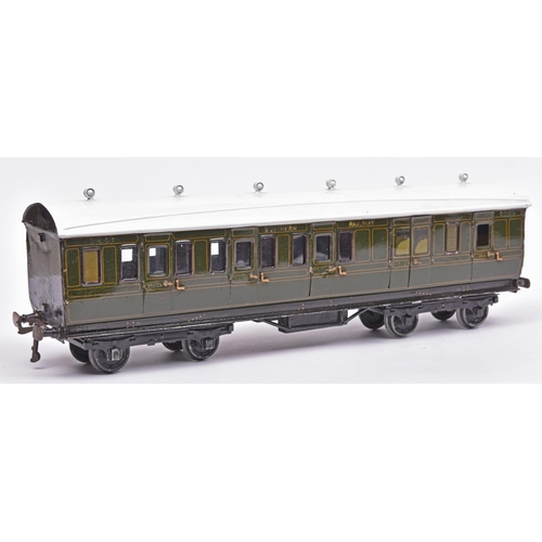 117 - A Bing Gauge One Southern Railway passenger coach. A third class bogie passenger brake, with opening... 