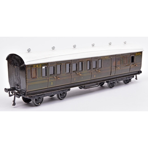 118 - Bing Gauge One Southern Railway passenger coach. A bogie 3rd class passenger brake with side corrido... 