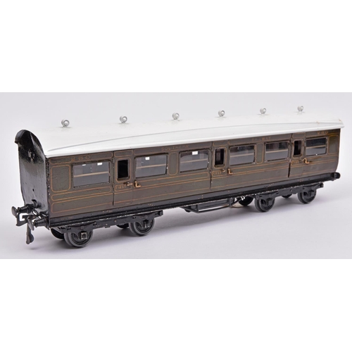 119 - A Bing Gauge One Southern Railway passenger coach. A bogie first class side-corridor coach, with thr... 