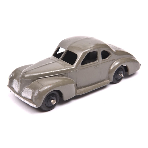 399 - Dinky Toys 39 Series Studebaker State Commander (39f). An example in dark grey with black ridged whe... 