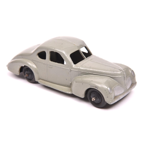 400 - Dinky Toys 39 Series Studebaker State Commander (39f). An example in light grey with black ridged wh... 