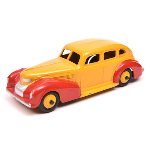 405 - A fine Dinky Toys 39 Series Chrysler Royal sedan (39e). A U.S. export example in deep yellow and red... 