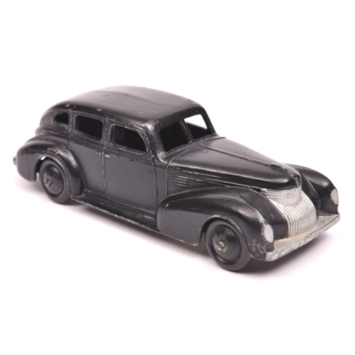 406 - A rare early Dinky Toys 39 Series Chrysler Royal sedan (39e). An example in satin black with black s... 