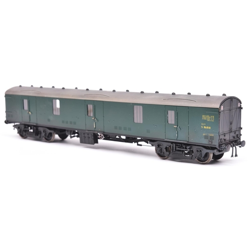 66 - An O gauge railway 7mm finescale kit built BR General Utility Van. A bogie GUV in dark green livery ... 