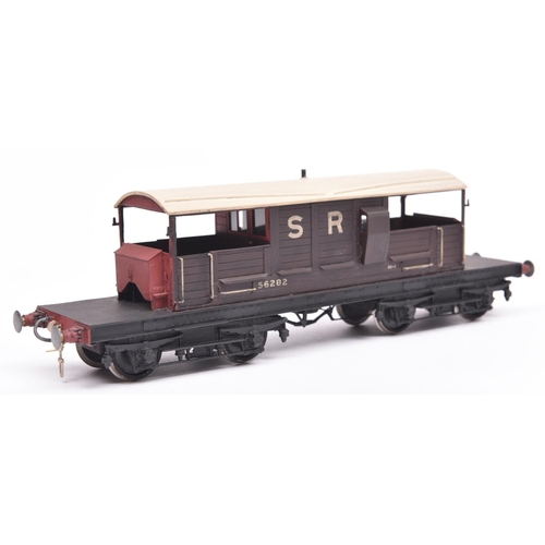 67 - An O gauge railway 7mm finescale kit built SR 25-ton bogie Goods Brake Van. S6282, in dark brown liv... 