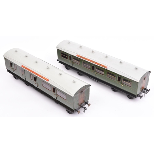 87 - 2 Bing Gauge One Southern Railway passenger coaches. A First/Third class Composite side corridor coa... 