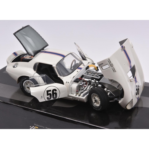 138 - Racing Legends Exoto Cobra Daytona Coupe. An example in white with blue/red racing flash, RN56. Boxe... 