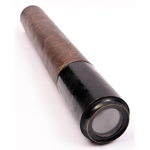 70 - A single draw telescope. A 19th Century example with brass barrel and leather covering. Brass lense ... 