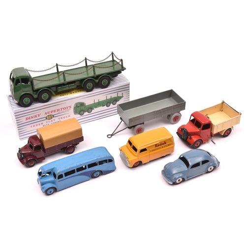 376 - 7 Dinky Toys. Foden FG Flatbed Truck with chains, in mid green with light green wheels. Bedford Tipp... 