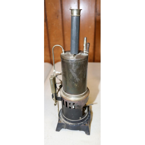 38 - A Doll & Co. live steam tinplate stationary engine. Single cylinder vertical engine with whistle, fl... 