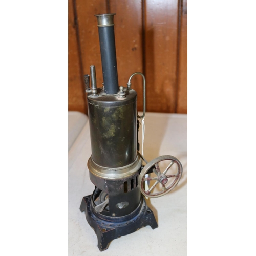 38 - A Doll & Co. live steam tinplate stationary engine. Single cylinder vertical engine with whistle, fl... 