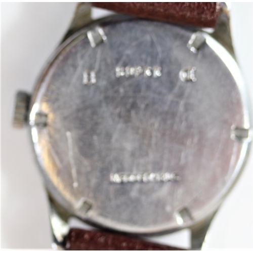 32 - DH marked Arsa wristwatch. Serial D21833H. Bright plated case, likely refinished, 34mm without crown... 