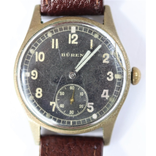 34 - DH marked Buren wristwatch. Serial D 24394 H. Plated case, almost all plating worn away, pitting to ... 