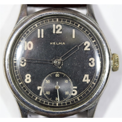 38 - DH marked Helma wristwatch. Serial D 6642 H. Plated case, some wear to plating, 32mm without crown. ... 