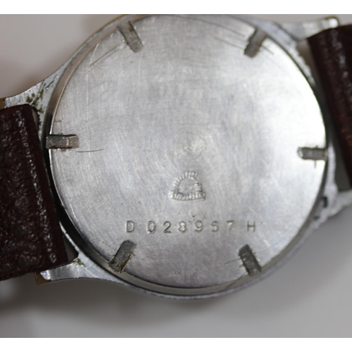 39 - DH marked Helma wristwatch. Serial D 028957 H. Plated case with brushed finish, some wear. Fixed bar... 