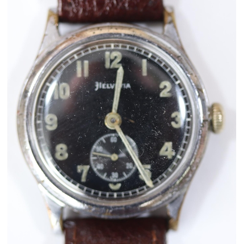 41 - DH marked Helvetia wristwatch. Serial D200159H. Plated case with brushed finish, wear and pitting to... 