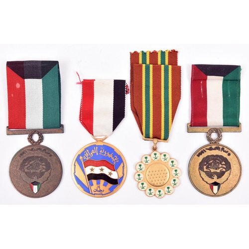 11 - Gulf War period medals (3): Saudi Arabia combat medal Nuth Al-Ma’rkat and 2 Kuwait Liberation medals... 