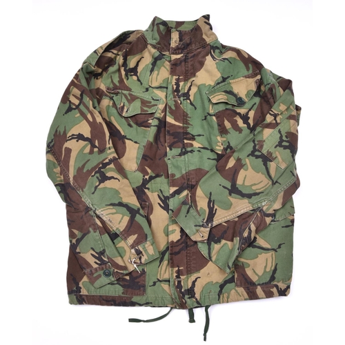 132 - A Denison type camouflage smock,  4 pockets, zip up and 4 button front, with shoulder straps. GC (so... 