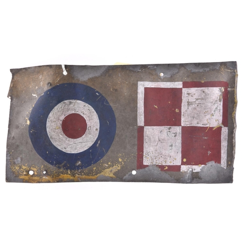 135 - A rectangular aluminium panel, 12” x 6½”, with dull grey finish, painted with small RAF roundel and ... 