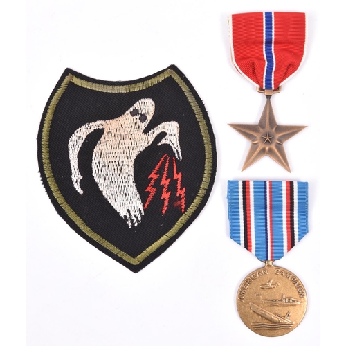 15 - USA WWII bronze star and African campaign medals, EF and NVF; and an embroidered patch of the “Ghost... 