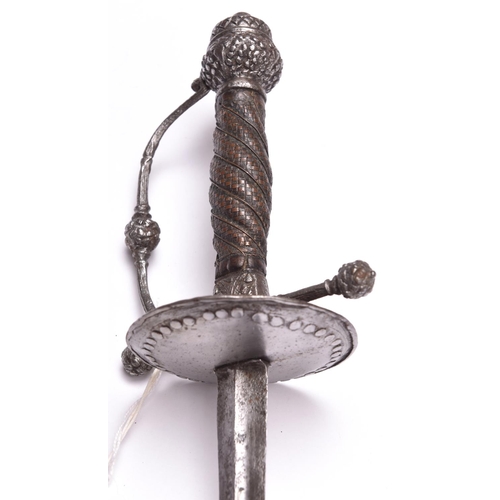 180 - A 17th century dish hilted rapier, c 1640, the 32” blade of concave diamond section, the iron hilt h... 