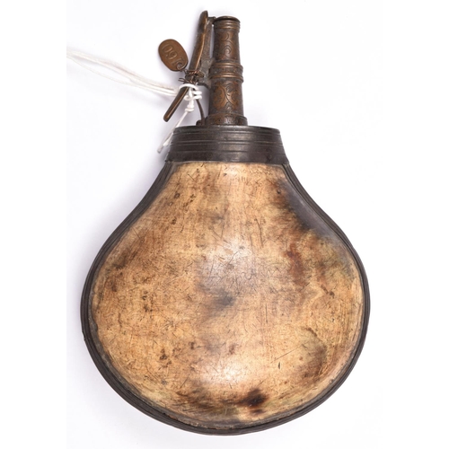 203 - A mid 18th century brass mounted bulbous cow horn powder flask, 7