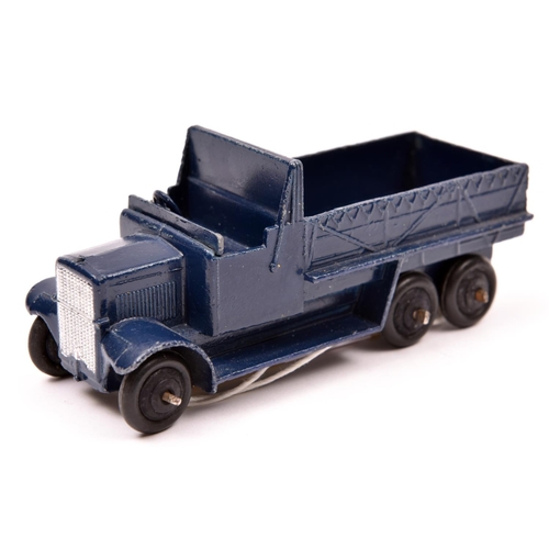 378 - Dinky Toys Six Wheeled Transport Wagon 25s. An example in dark R.N. blue with black ridged wheels. T... 