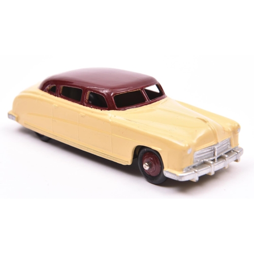 380 - Dinky Toys Hudson Commodore Sedan 139. An example in deep cream with maroon roof and wheels with bla... 