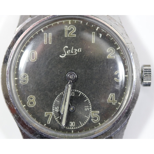 69 - D marked Selza wristwatch. Serial D 509445. Plated case with brushed finish, light wear, 33mm withou... 