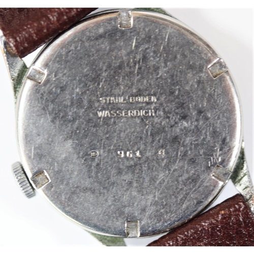 79 - DH marked Phenix wristwatch. Serial D 961 H. Bright plated case, some wear to plating, 33mm without ... 