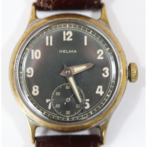71 - Helma wristwatch. Plated case with brushed finish, heavy wear, most plating missing. Fixed bars. Scr... 