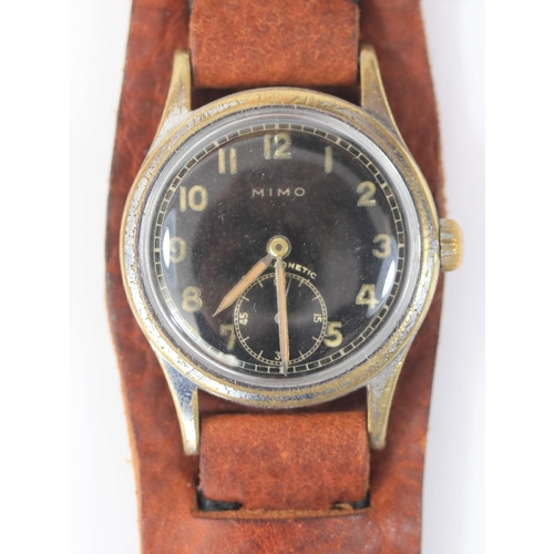 81 - Unmarked Mimo wristwatch. Serial 331600. Plated case, brushed finish, worn. Springbars. Screw caseba... 