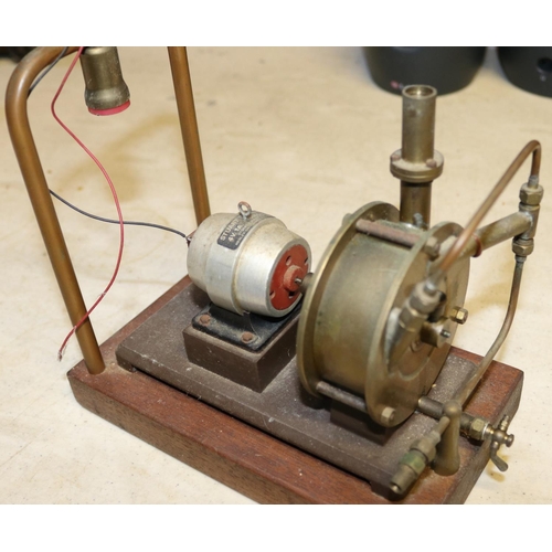 45 - A Stuart Models dynamo. Rated at 4v. 1a. and 8000rpm.  Connected to a brass steam driven fan and wir... 