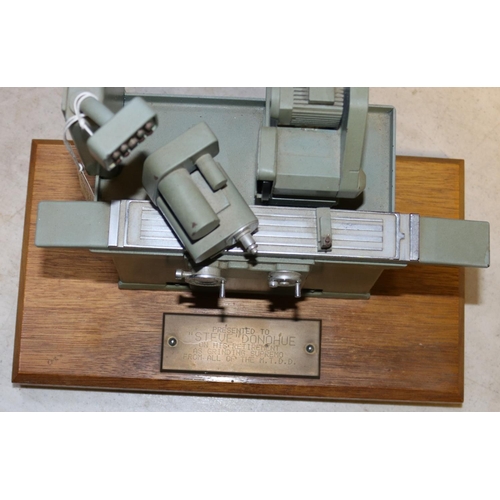 47 - A small metal model of an industrial grinding machine. A well detailed model presented as a retireme... 