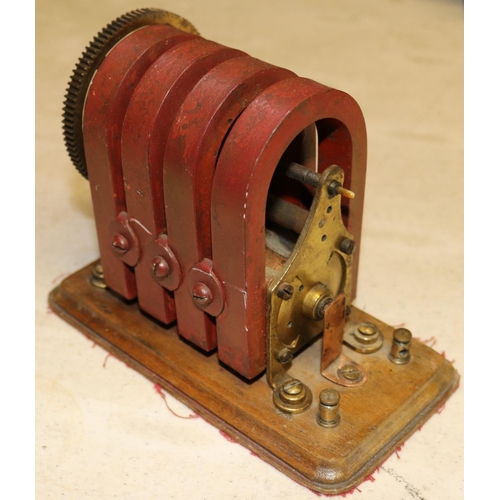 53 - A hand-cranked magneto machine of brass and copper construction with 4 permanent magnets. 'No.8' sta... 