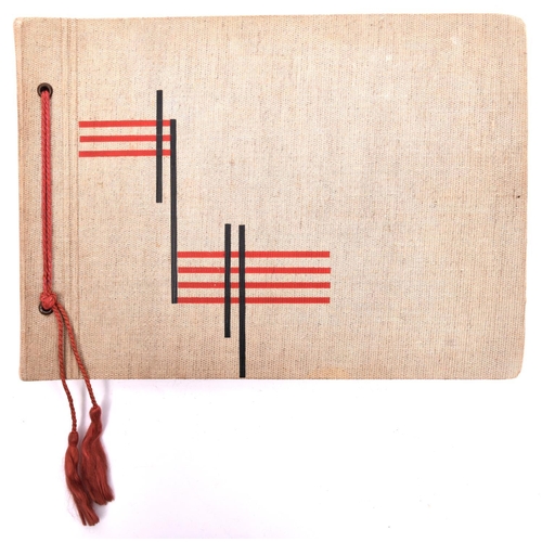 105 - A Third Reich Naval photograph album, the inside of the cover bearing date stamp “18 Marz 1944”, con... 