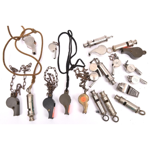 26 - 21 various whistles, mostly WWII military: 3 Air Ministry marked dinghy whistles; 7 “Metropolitan” t... 