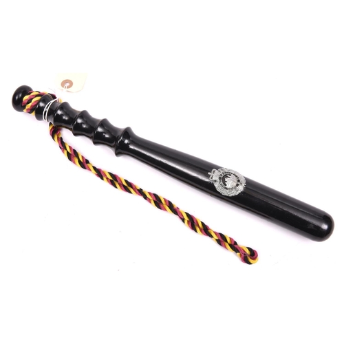 62 - A presentation truncheon of the Royal Hong Kong Police (1967-1997) thickly black lacquered, with chr... 