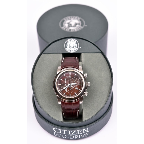 103 - A Citizen Eco-Drive Chronograph Watch WR100 with quartz movement. Stainless steel case and a dark br... 