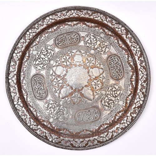 14 - A large 19th Century Cairoware tray set. Of possibly Egypt, Morocco or Syria Mamluk origin. Comprisi... 