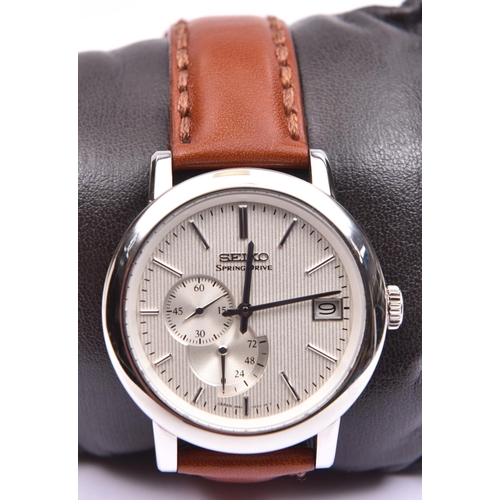 204 - A Seiko Spring Drive Automatic watch with automatic self winding mechanism. With stainless steel cas... 