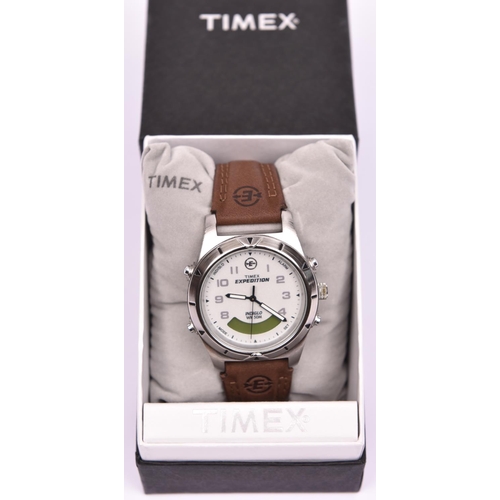 207 - A Timex Expedition Indiglo WR 50M watch with quartz movement, stainless steel case, silvered face an... 