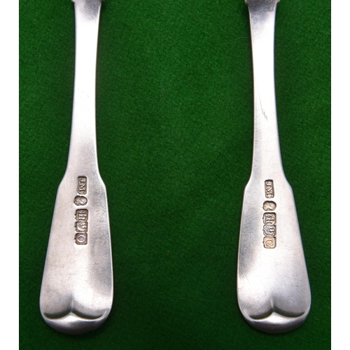 23 - 2x matching Georgian Scottish dessert spoons with scalloped decoration to handles and engraved crest... 