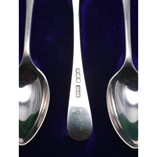 28 - A cased set of 6 silver teaspoons of plain design. Hallmarked Sheffield 1920, 'J.D&S'. Combined 55g.... 