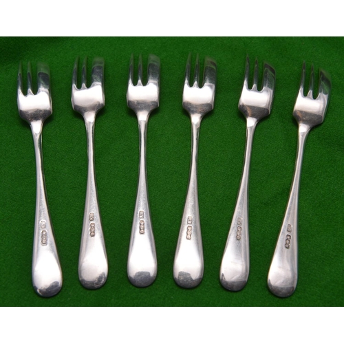 30 - A set of six silver cake forks of plain design. Hallmarked Sheffield 1937, 'EV'. VGC. £20-40